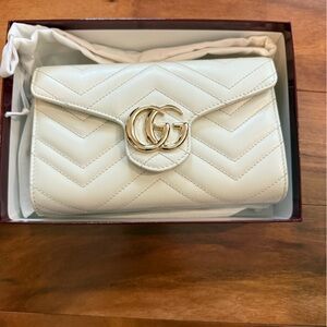 Gucci Cream Clutch with Gold Accents